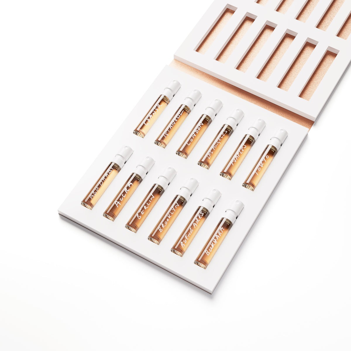 'Nomad' Fragrance Sampler Set showing 12 perfumes inside box